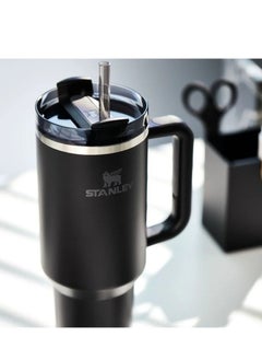 Stanley Quencher H2.0 FlowState Vacuum Insulated Tumbler – 40 oz Black Stainless Steel Travel Mug with Leakproof Lid & Reusable Straw | Double-Walled Design Keeps Drinks Hot for 7 Hours & Cold for 24 Hours | Durable, Portable & Ideal for Water, Coffee, Smoothies & More  - Image 4