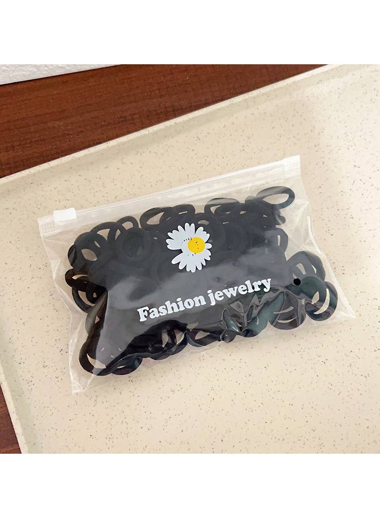 Soft Hair Ties - 40 pieces in classic black. Soft and flexible, seamless, they hold your hair securely in place without any damage. Stylish black color for all occasions, for both children and adults, practical and stylish with every look. Your perfect choice for simplicity and beauty in every hairstyle.