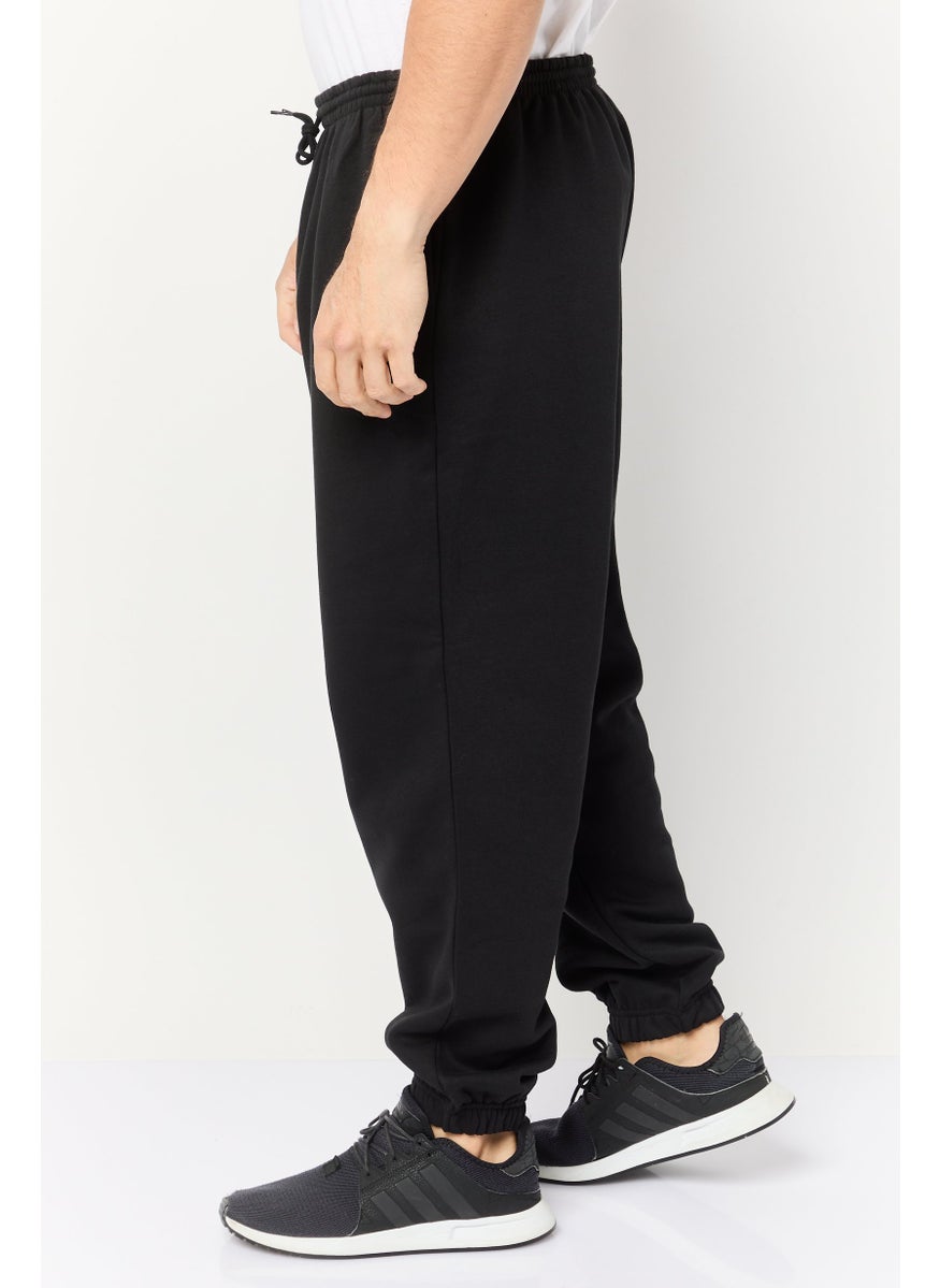 Reebok Men Sportswear Fit Outdoor Sweatpants, Black  - Image 3