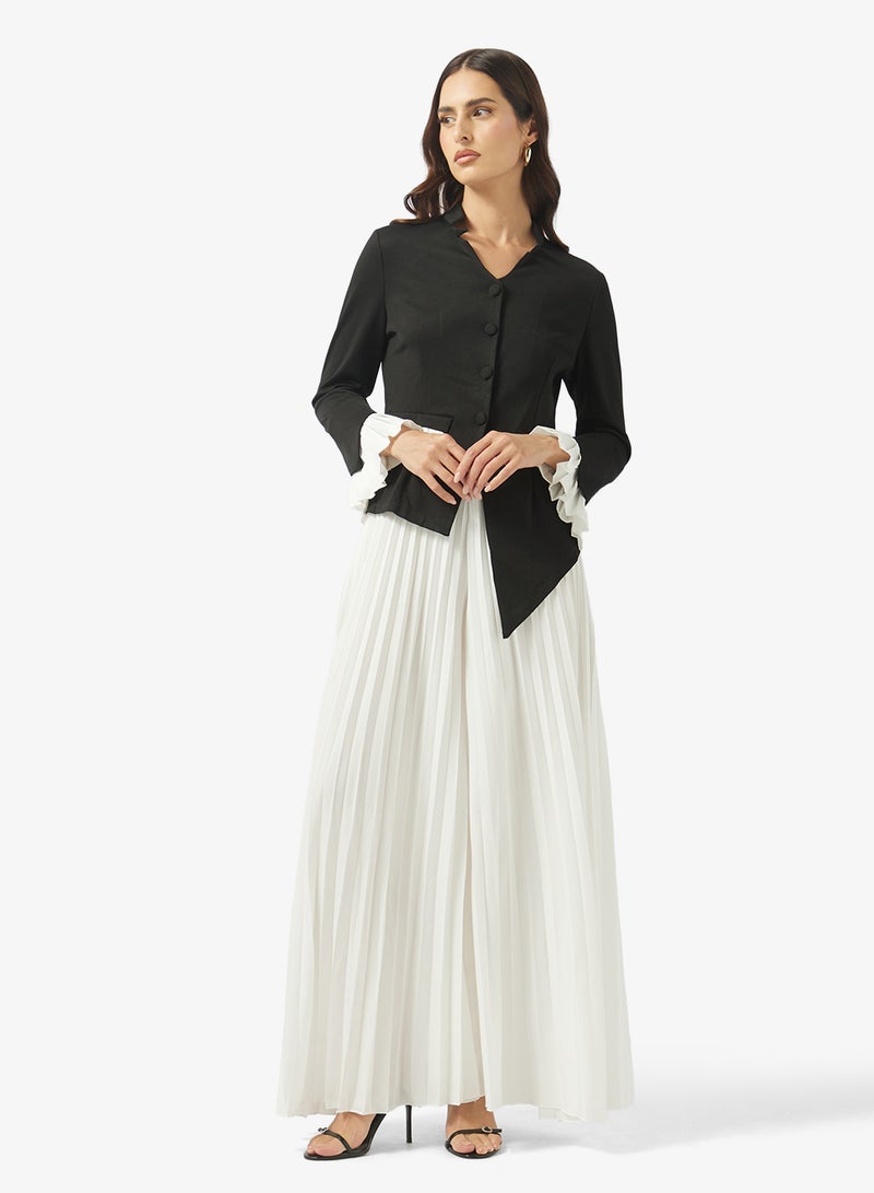 ايلا طقم بلوزة بألوان متضاربة وبنطلون مطوي - Image 1