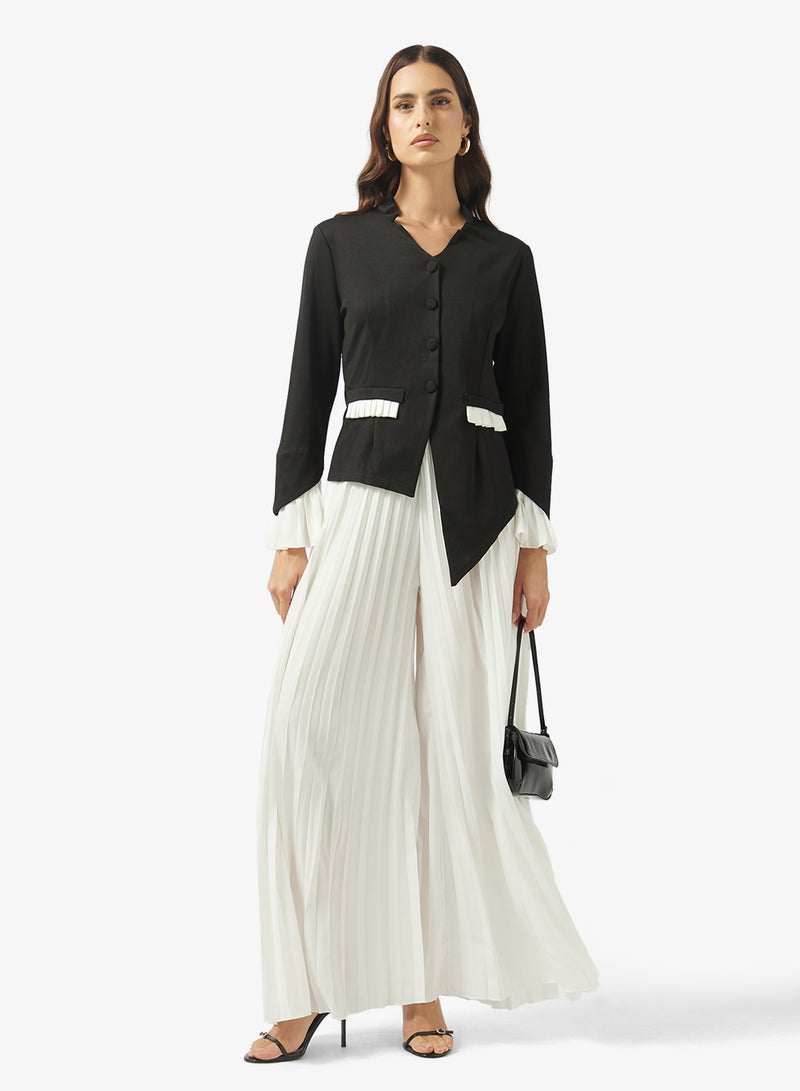 ايلا طقم بلوزة بألوان متضاربة وبنطلون مطوي - Image 5