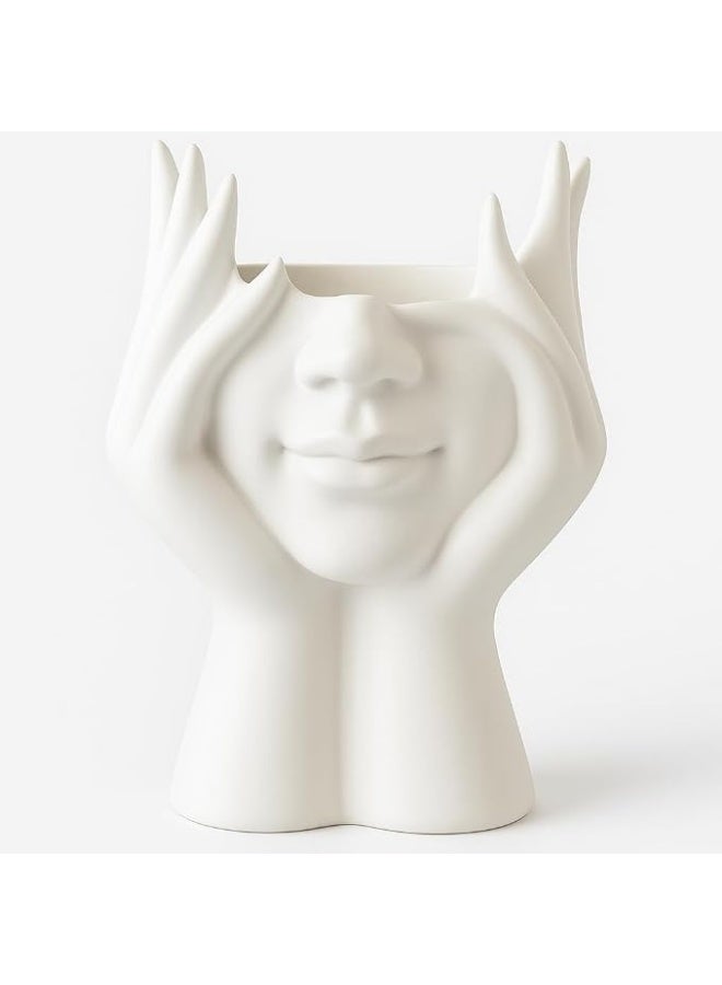 منظم فرش أنيق بتصميم فني على شكل وجه ويدين، مناسب لترتيب فرش المكياج والرسم والأقلام. يجمع بين الاستخدام العملي والشكل العصري ليضيف لمسة مميزة إلى أي مساحة. - Image 1