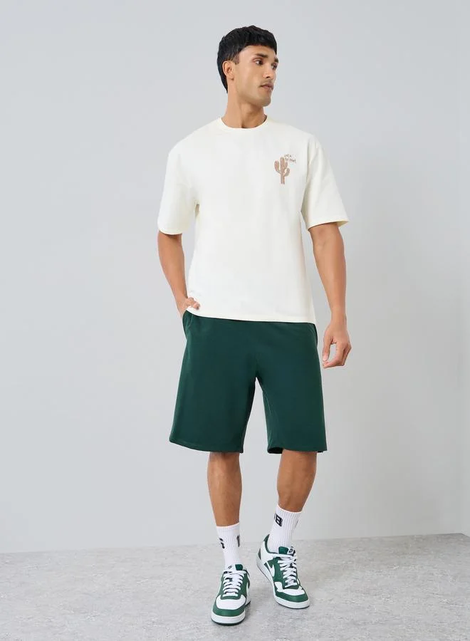 Styli Men Graphic Oversized T-Shirt and Shorts Co-Ords