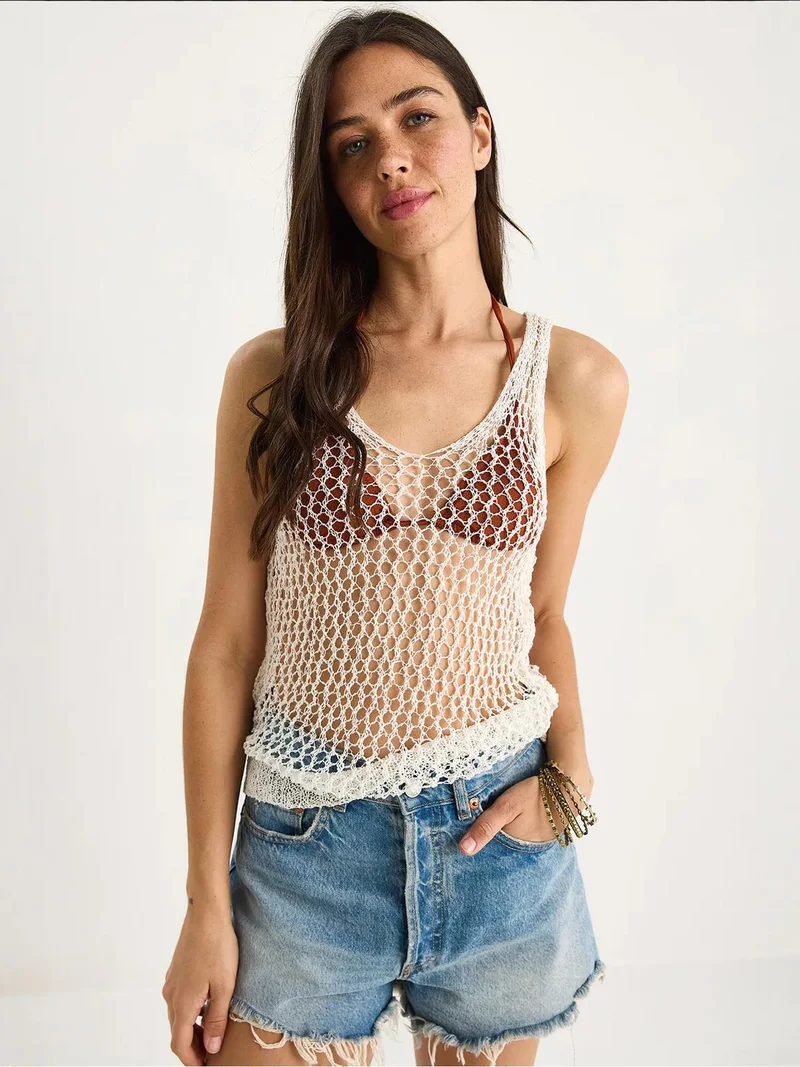 بيانكو لوتشي بلوزة  محبوكة بنقوش بياقة مستديرة وتفاصيل شبكية