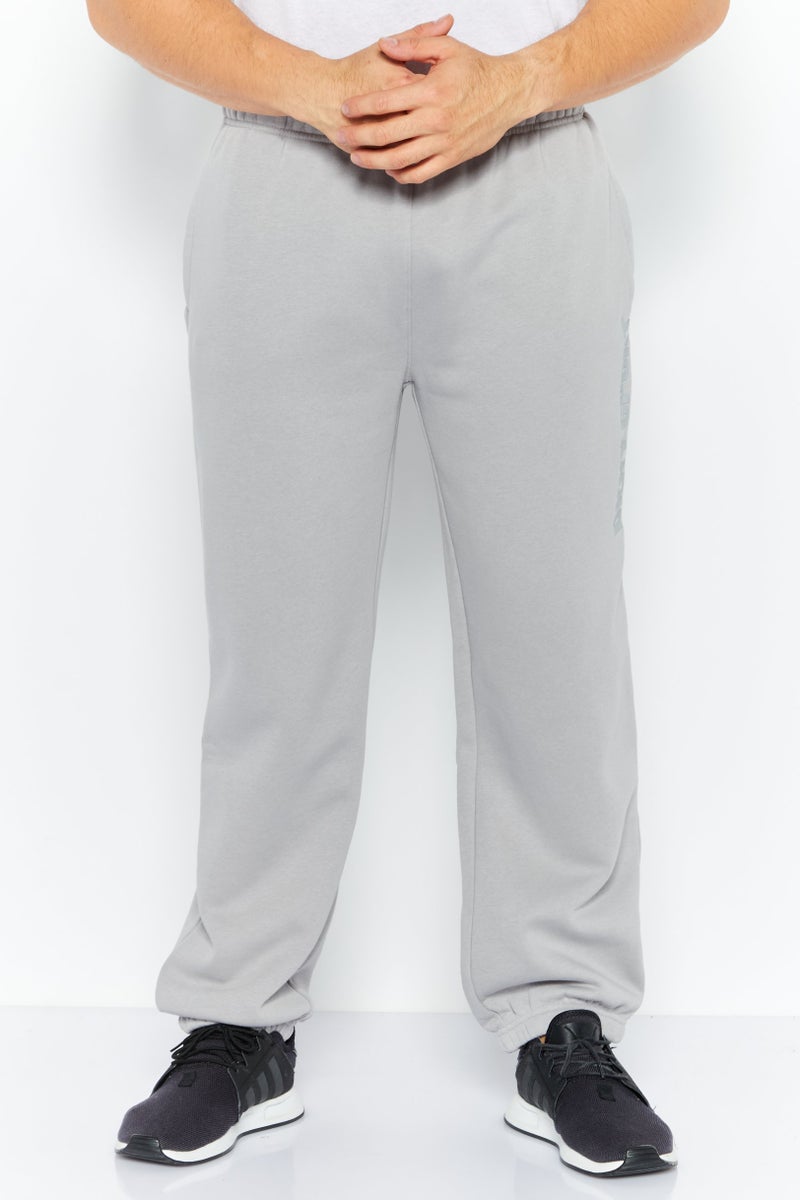 DKNY Sport Men Sportswear Fit Drawstring Training Sweatpants, Silver  - Image 1