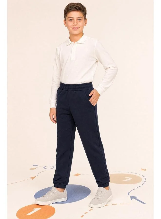 Perendi Elastic Comfortable Fit Pocketed Unisex Sweatpants for Boys and Girls.