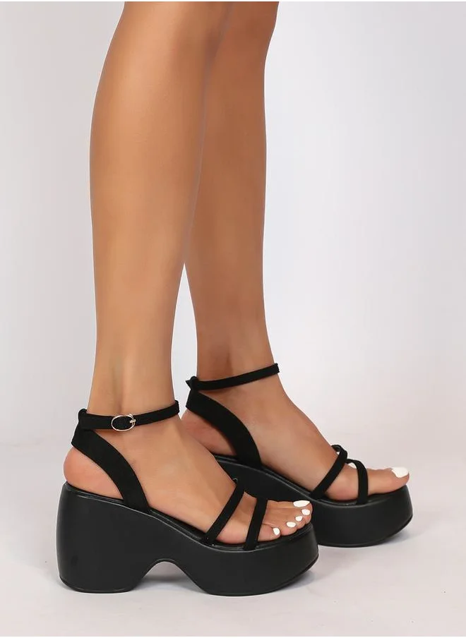 Sneak-a-Peek Solid Ankle Strap Wedge Heel Sandals by Styli