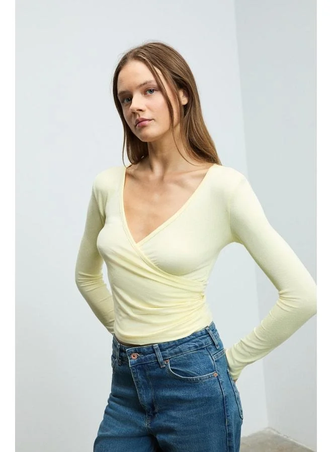 GRIMELANGE CALLORIA Women's V-Neck Long Sleeve Slim Fit Yellow Blouse.