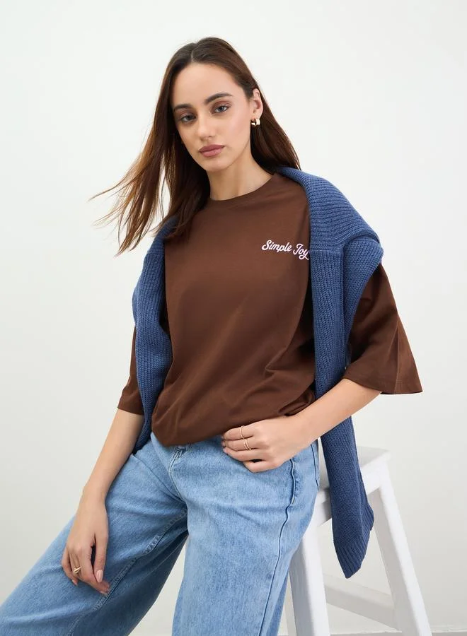 Styli Brown Oversized Slogan T-Shirt