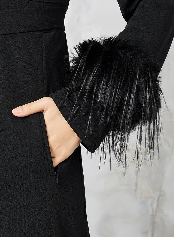 Styli Faux Feather Textured Knit Jumpsuit with Embellished Buckle