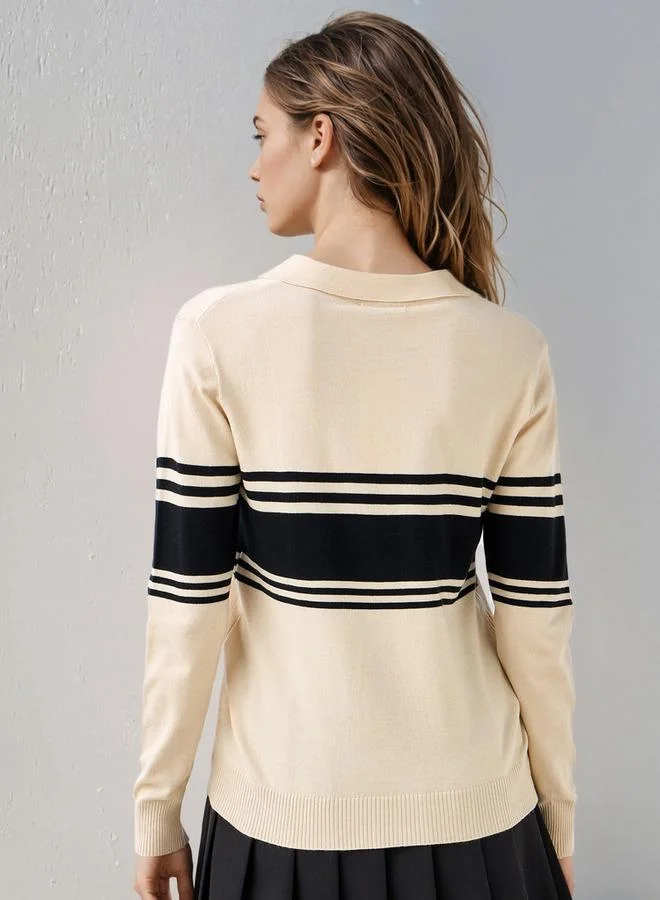 تواكستريمز كنزة بياقة