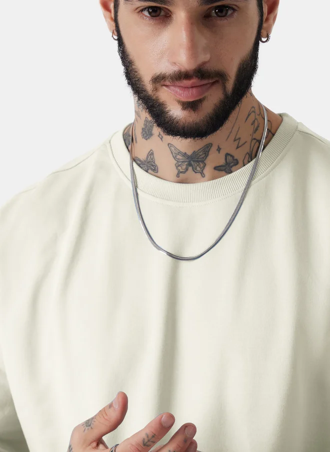 ذا سوليد ستور The Souled Store Men Solid Off White Cotton Oversized Fit T-Shirt