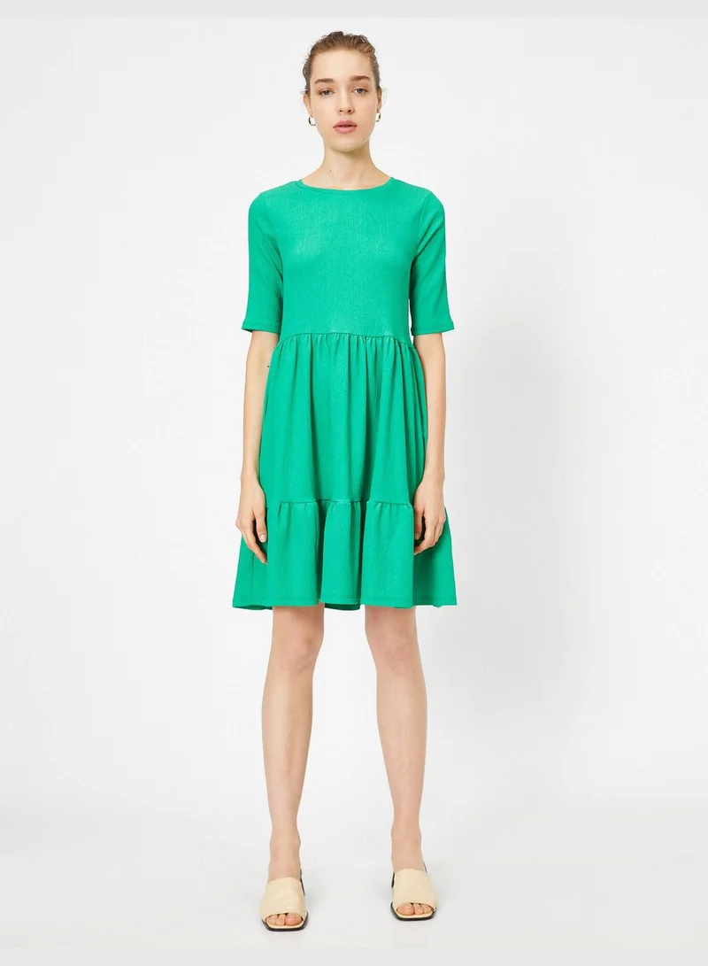 كوتون فستان بتفصيلة كشكش