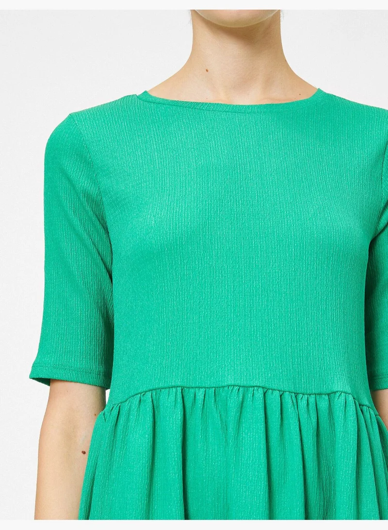 كوتون فستان بتفصيلة كشكش