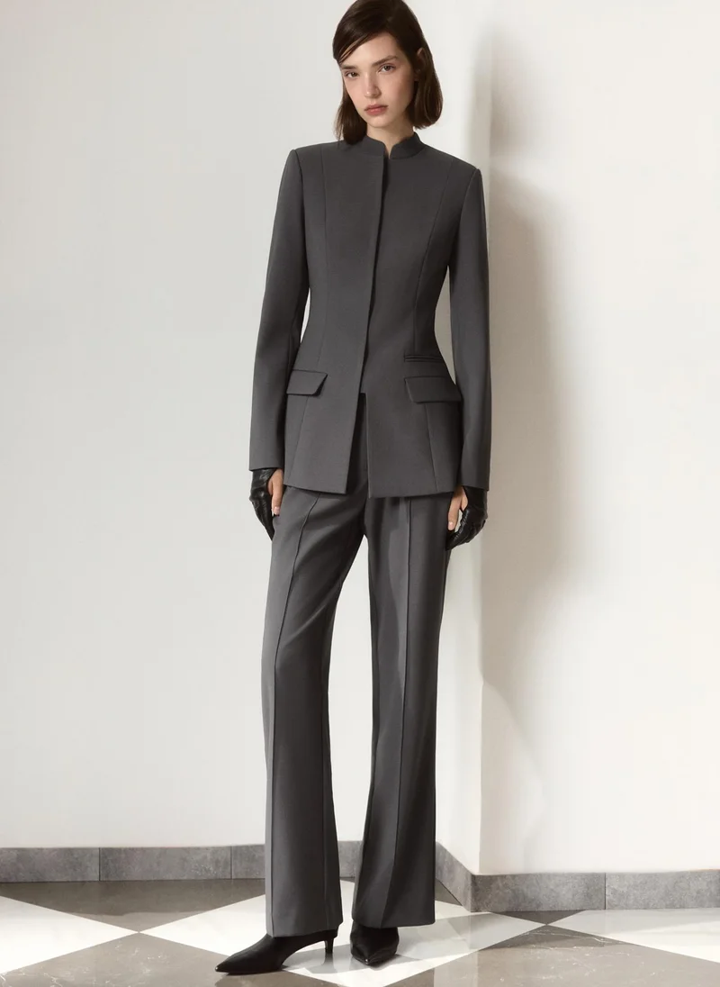 Flared trousers with creases