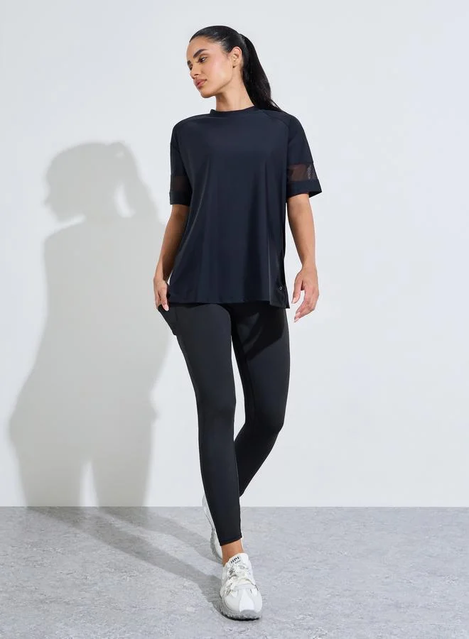 ستايلي اكتيف Black Solid Mesh Insert Sleeves Side Slit Active T-Shirt