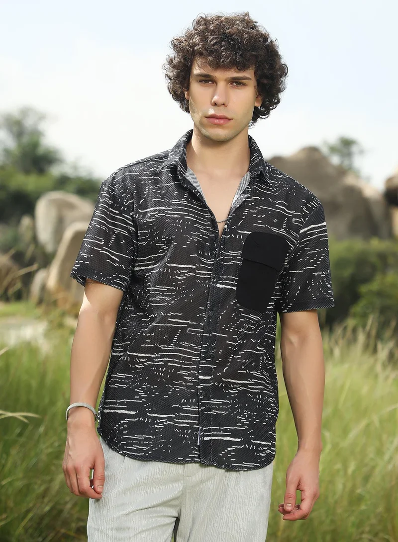 Campus Sutra Campus Sutra Men's Midnight Black Flick-Block Shirt For Casual Wear | Spread Collar | Short Regular Sleeves | Button Closure | Oversized Shirt Crafted With Comfort Fit For Everyday Wear