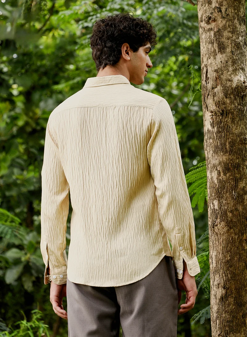 Campus Sutra Campus Sutra Men Solid Creased-Tactile Shirt | Spread Collar Long Cuffed Sleeves | Button Closure Curved Hem | Solid Creased | Woven Fabric For Casual & Daily Wear | Saltbox Beige