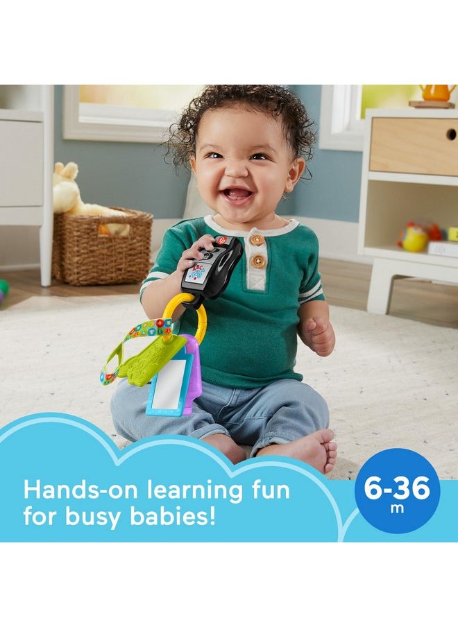 Fisher-Price - Fisher-Price Baby Travel Toy Laugh & Learn Play & Go Activity Keys with Learning Music, Teether & Mirror for Infants Ages 6+ Months - Image 1