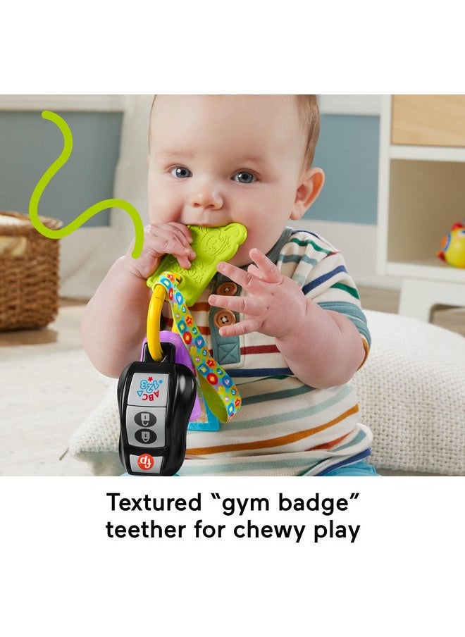 Fisher-Price - Fisher-Price Baby Travel Toy Laugh & Learn Play & Go Activity Keys with Learning Music, Teether & Mirror for Infants Ages 6+ Months - Image 1