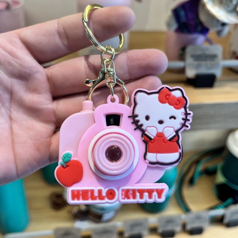 Cartoon Projector Keychain: Yellow Durable Plastic Multifunctional Toy - Adorable Design for Kids, Fans and Bag Accessory Use - Image 5