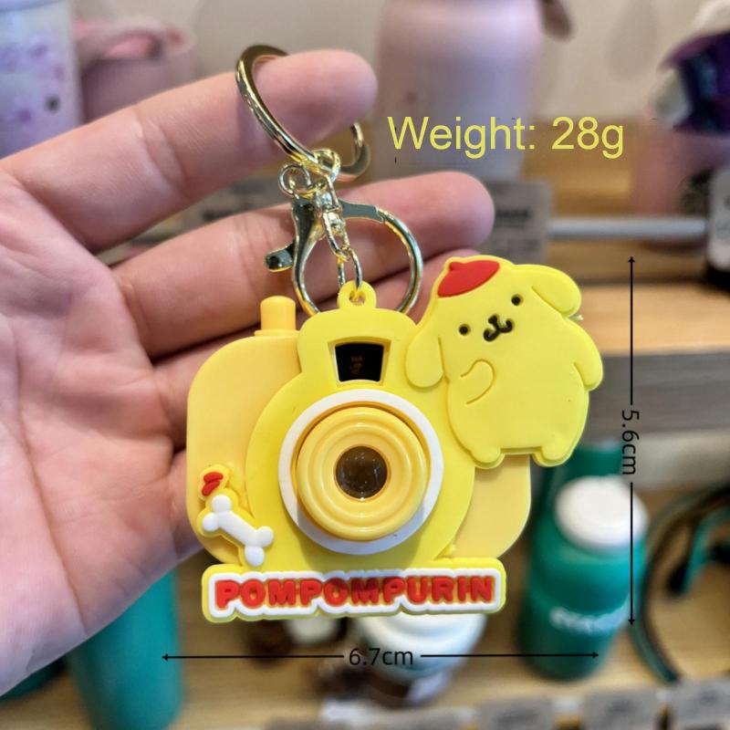 Cartoon Projector Keychain: Yellow Durable Plastic Multifunctional Toy - Adorable Design for Kids, Fans and Bag Accessory Use - Image 1