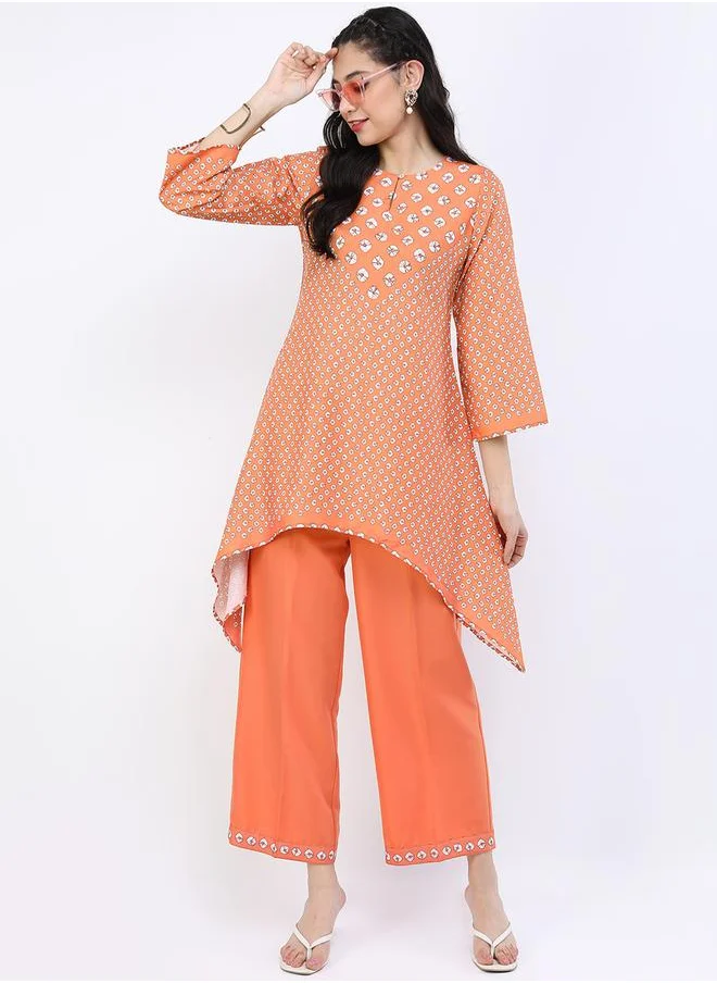 فيشود Women Orange Printed Kurta and Trouser Set by Styli