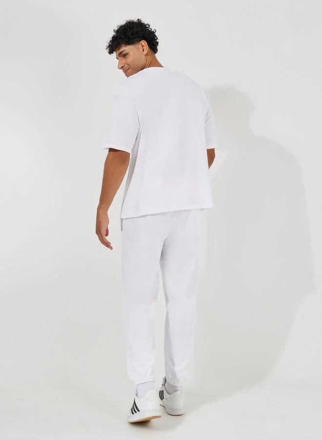 Styli Styli Premium Varsity Print Heavy Jersey Oversized T-Shirt and Joggers Co-Ords