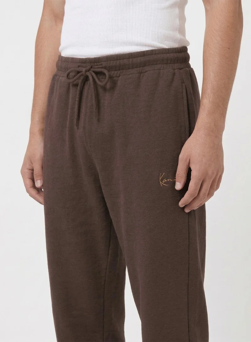 Karl Kani  Small Signature Essential Baggy Sweatpant for Men | Best Price UAE