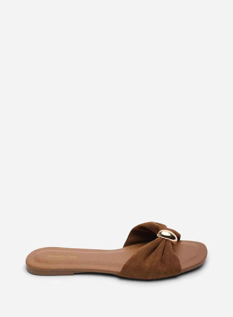 من أين هذه Arc Ruched Buckle Cognac Suede Slide On Sandal
