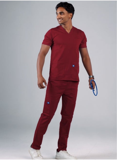 Scrub Comfortable Lycra Wine fabric with many pockets is meticulously crafted to retain its color without fading with repeated washing