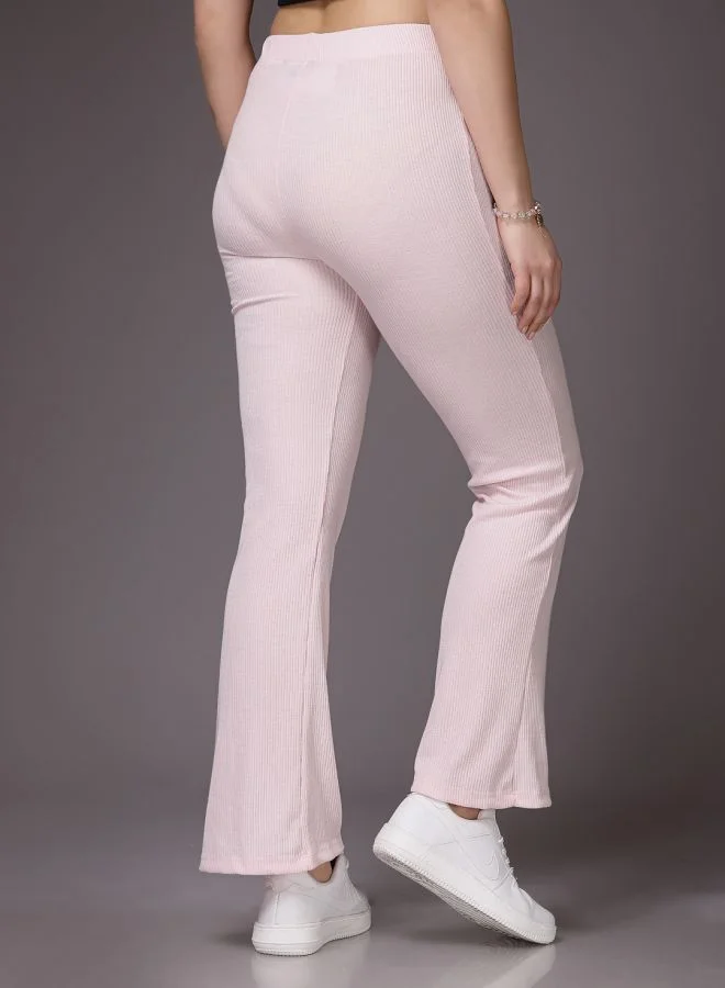 مرفوعة Women Fit and Flared Solid Mid-Rise Trousers