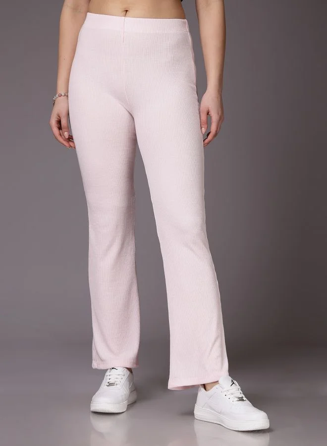 مرفوعة Women Fit and Flared Solid Mid-Rise Trousers