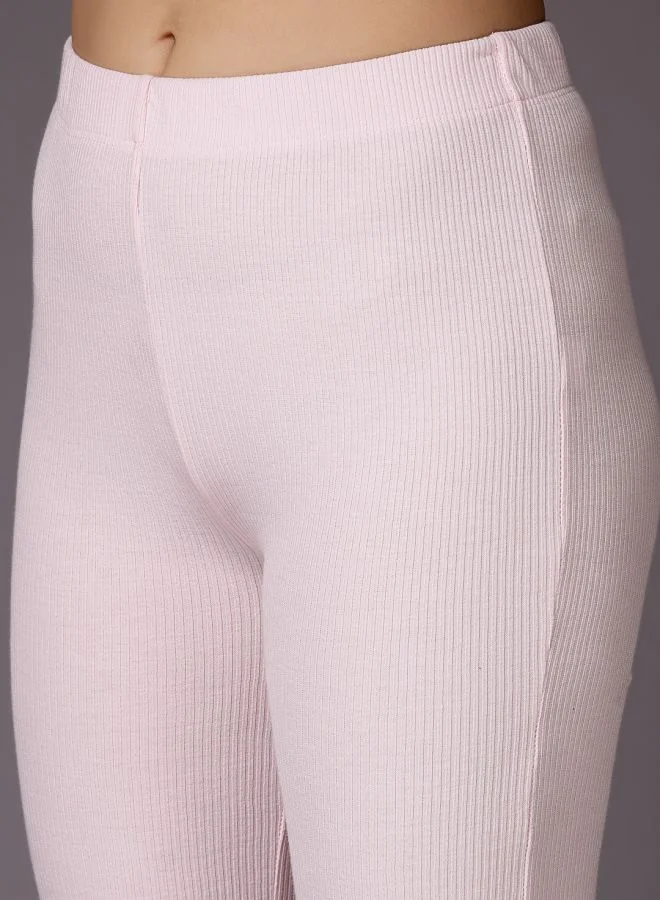 مرفوعة Women Fit and Flared Solid Mid-Rise Trousers