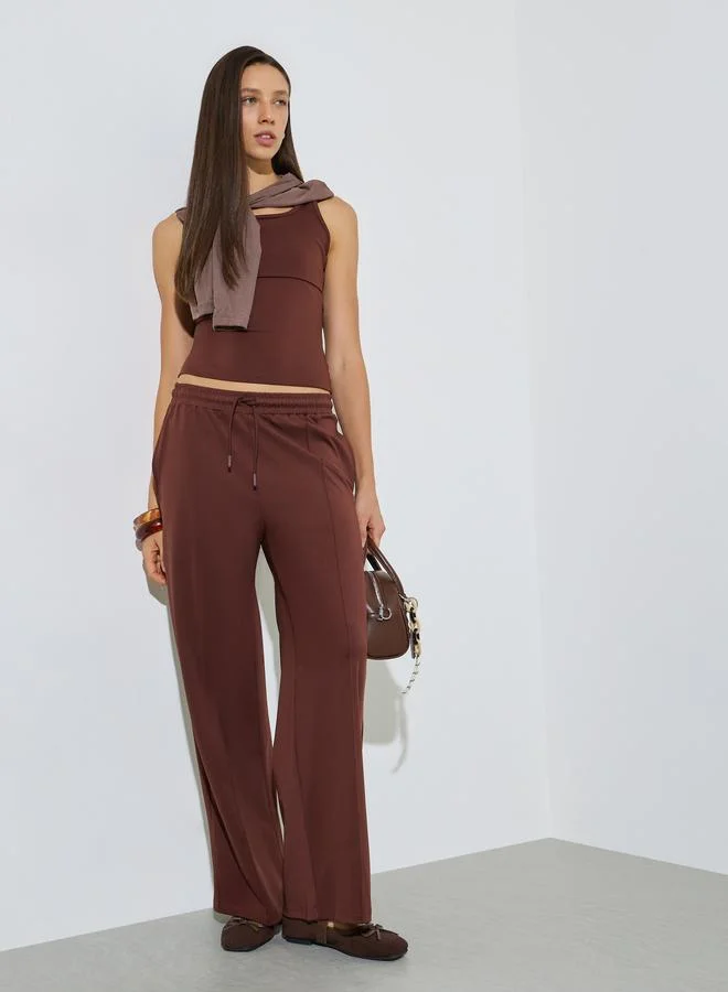 ستايلي Brown Scuba Wide Leg Joggers With Piping Detail