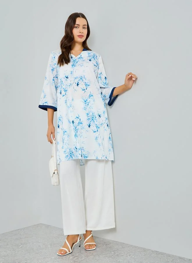 تايك تو طقم منسق تونيق بحافة واسعة مطبوع بزخارف زهور وبنطال