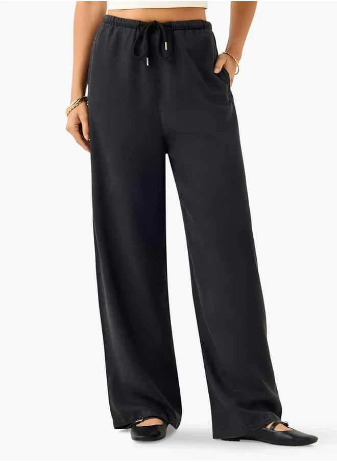 لي كوبر Lee Cooper High-Rise Wide Leg Pants with Drawstring Closure and Pockets