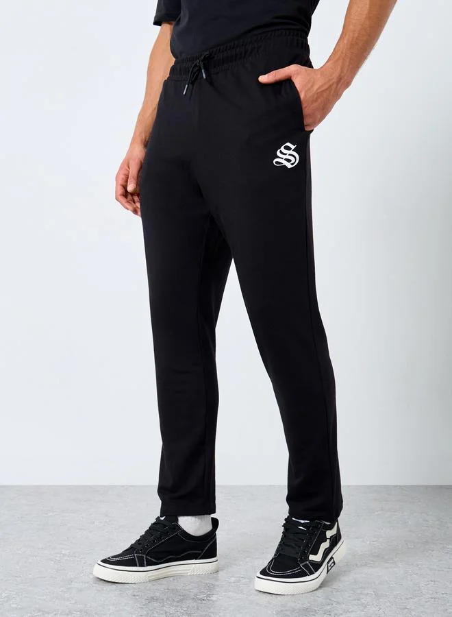 Styli Men Black Straight Fit Joggers with Minimal Print