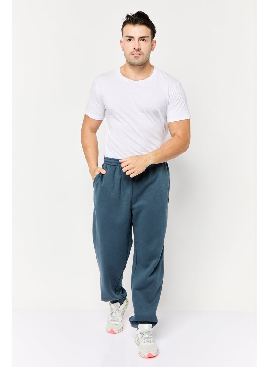 TapouT Men Sportswear Fit Brand Logo Training Track Pants, Slate Blue  - Image 2