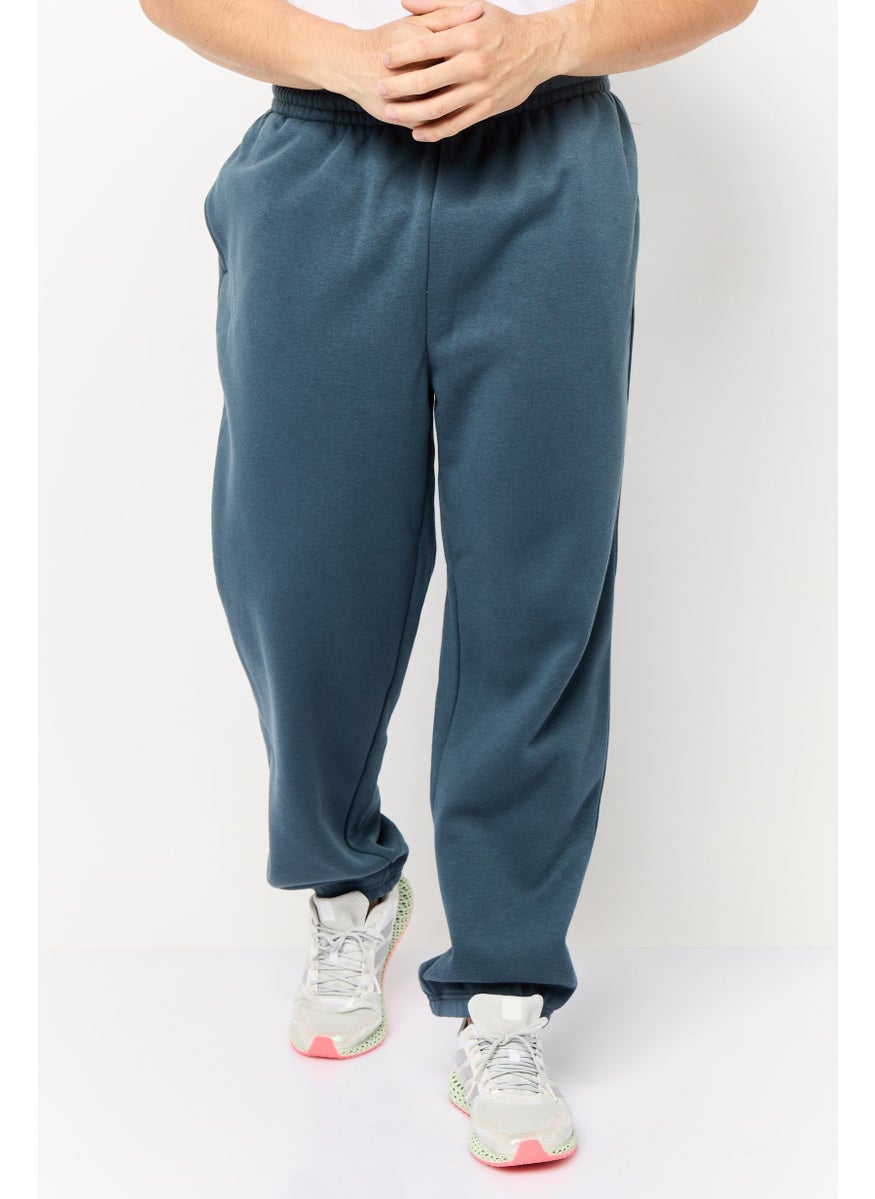TapouT Men Sportswear Fit Brand Logo Training Track Pants, Slate Blue  - Image 1