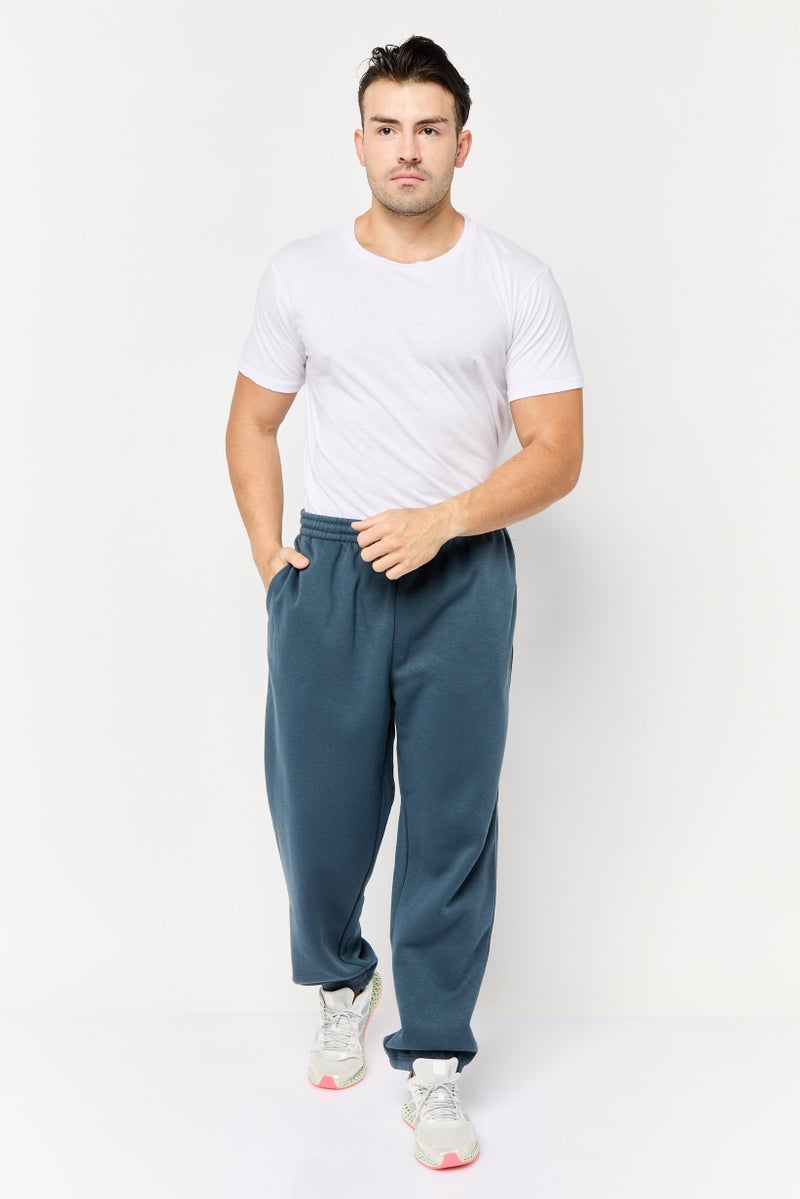 TapouT Men Sportswear Fit Brand Logo Training Track Pants, Slate Blue - Image 2