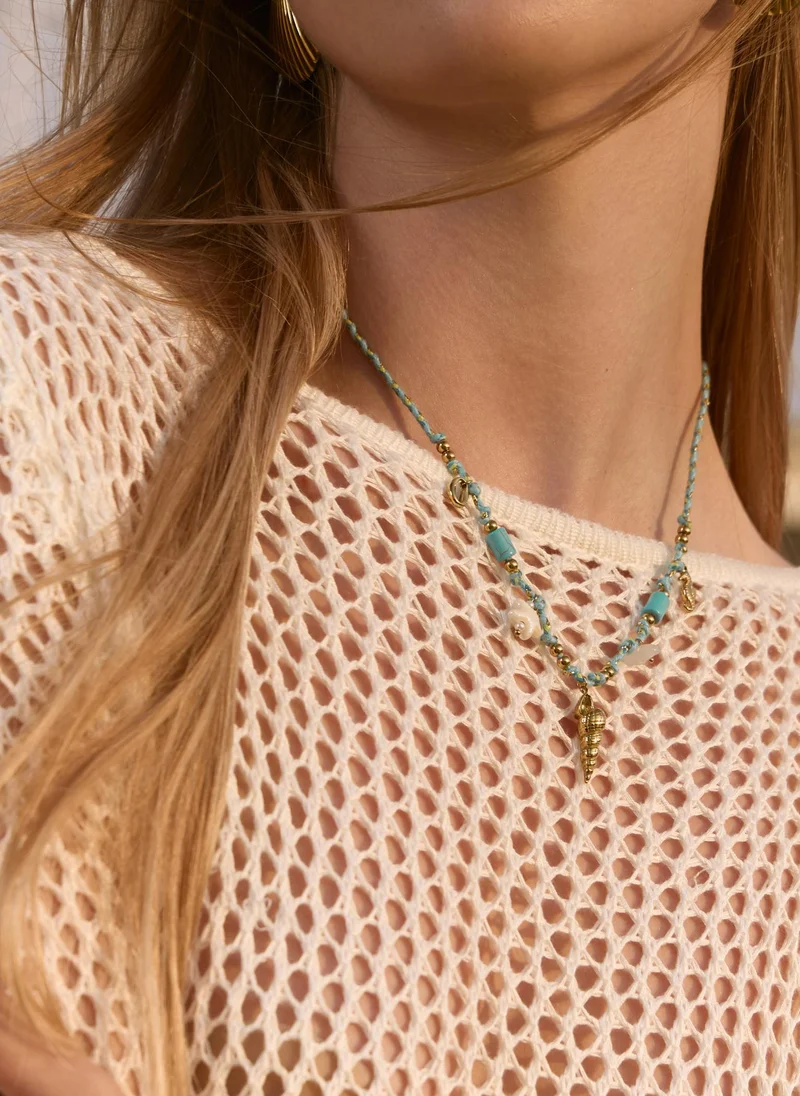 Bright necklace with sea decor