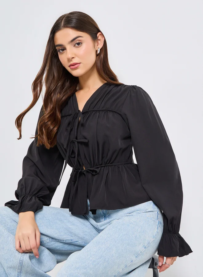 تايك تو بلوزة بيبلوم بياقة ورباط