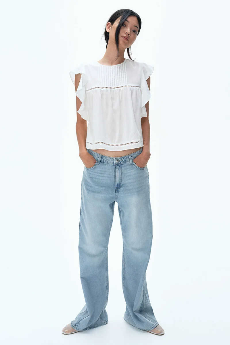 اتش اند ام بلوزة بأكمام مكشكشة