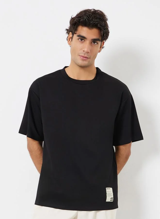 Styli Men Oversized Soft Heavy Jersey T-Shirt with Badge
