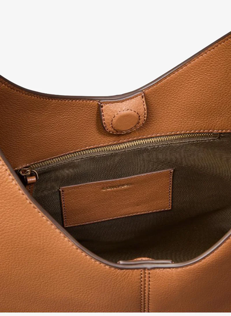 Calvin Klein  Leather Asymmetric Slouch Bag for Women | Best Price UAE