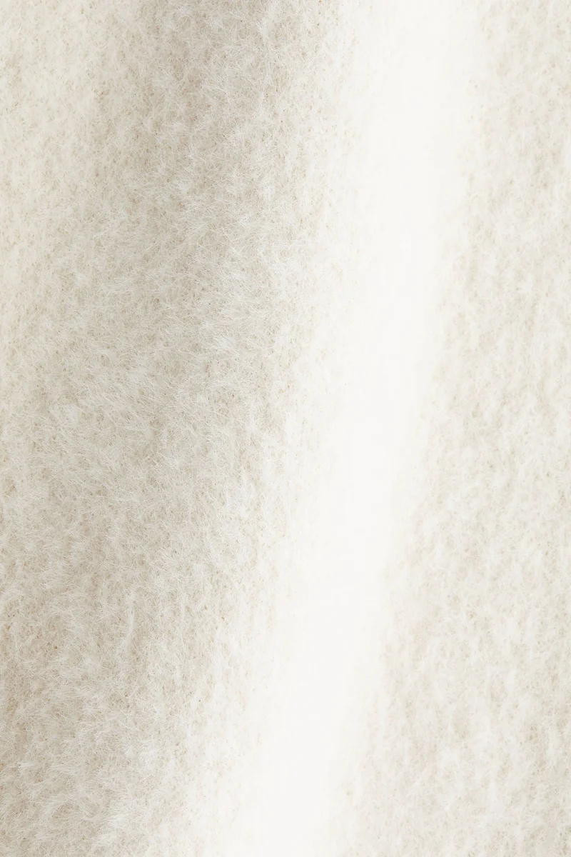 اتش اند ام تنورة محبوكة من قماش منفوش