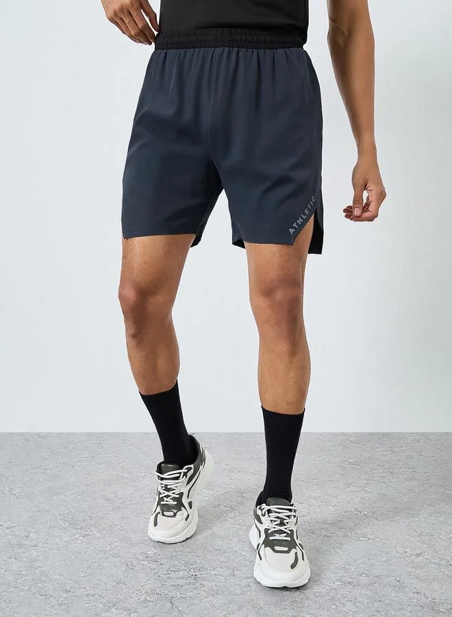 Men Workout Shorts with Print and Slit Detail
