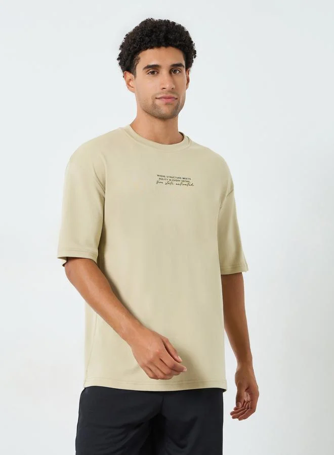 Styli Active Men Oversized Minimal Front Print T-Shirt