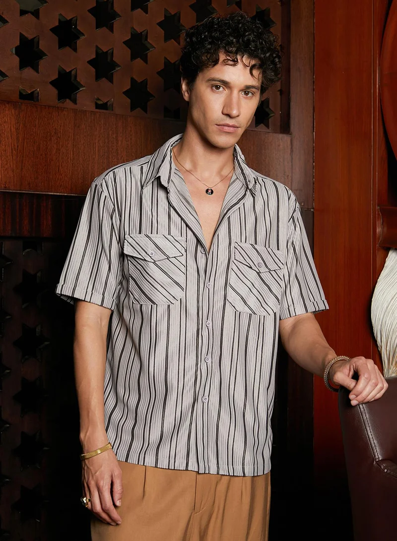 Campus Sutra Campus Sutra Men's Cloud Grey Multitrack-Striped Utility Shacket For Casual Wear | Spread Collar | Short Sleeve | Button Closure | Overshirt/Shacket Crafted With Comfort Fit For Everyday Wear
